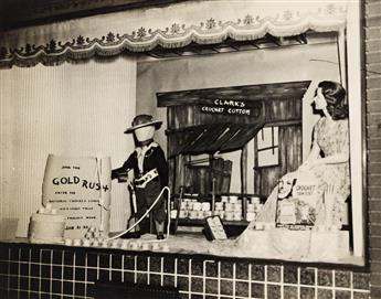 (WINDOW DISPLAYS) A group of 16 photographs of posed, fashionably dressed mannequins, some with seasonal decorations.